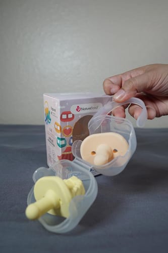 Customer photo review of Newborn Teether Pacifiers 2 in 1 (6 Months onwards)
