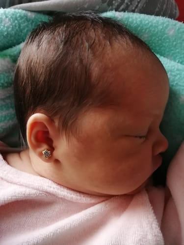 Customer photo review of AROS ABRIDORES DE BEBE STAR ZIRCÓN 18K