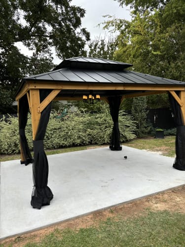 Customer photo review of SUNJOY 12x16 Outdoor Cedar Framed Gazebo with 2-tier Metal Roof and Ceiling Hook - Standard Natural Cedar
