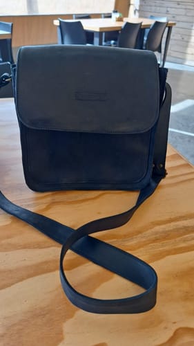 Customer photo review of POSTMAN HANDBAG