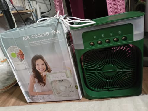 Customer photo review of Mini Portable Fan Air Cooling fan Humidifier Purifier Mist Cooler with 7 Colors LED Light