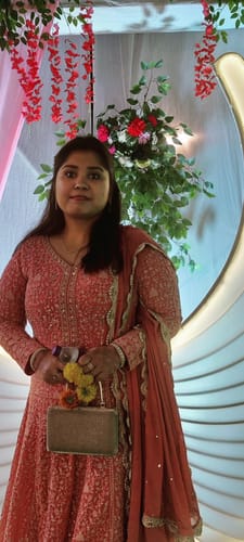 Customer photo review of Anushka Sharma Golden Flower Dangling Earrings