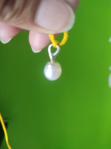 Customer photo review of Certified White South Sea Pearl Undrilled 5.35 Cts (5.88 Ratti) Australia