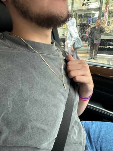 Customer photo review of *NEW* 14K Divino Nino Pendant W/ Hollow Rope Chain JTJ™