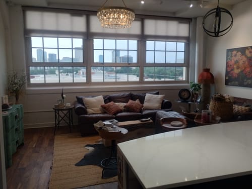 Customer photo review of SmartWings Motorized Light Filtering Roller Shades 70% Blackout Safari