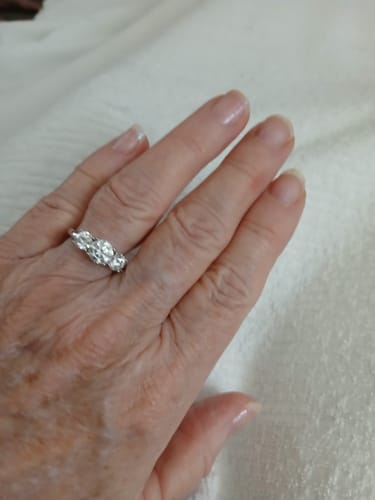 Customer photo review of Classic Three Stone Round Cut Moissanite Engagement Ring