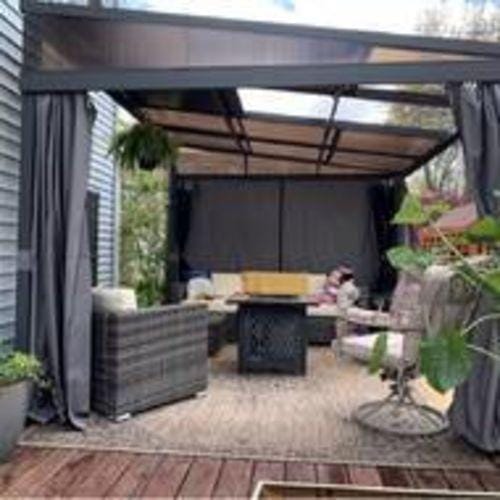 Customer photo review of SUNJOY 10x12 Polycarbonate Roof Lean to Gazebo, Wall Mounted Gazebo with Curtains and Netting