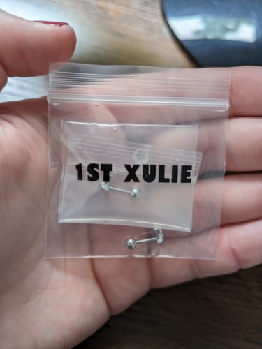 Customer photo review of "Star Trails" 925 Sterling Silver Dainty Four-Pointed Star Stud Earrings, Celestial Jewelry