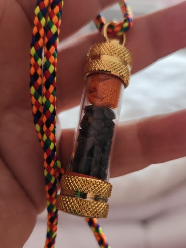 Customer photo review of Amulette Thai contre le mauvais temps - Vénérable Phrakru Sangharaj Uthaï.