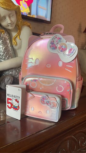 Customer photo review of Loungefly Sanrio Hello Kitty 50th Anniversary Clear and Cute Cosplay Mini Backpack - Preorder