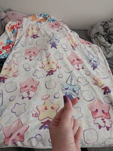 Customer photo review of Daydream Daycare Throw Blanket
