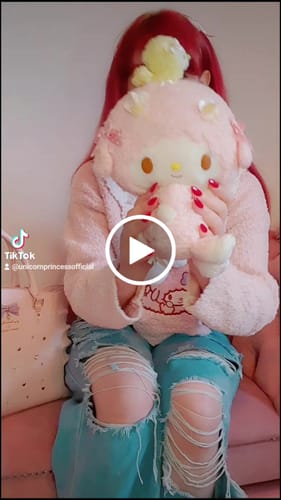 Customer video review of My Sweet Piano Collar Pom Pom Short Sweater