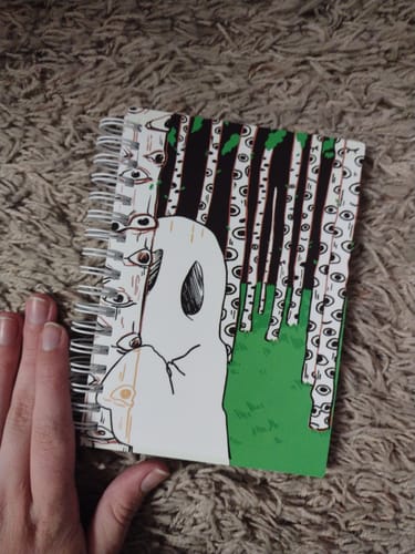 Customer photo review of Forest Peaking Ghost Small Reusable Sticker Book