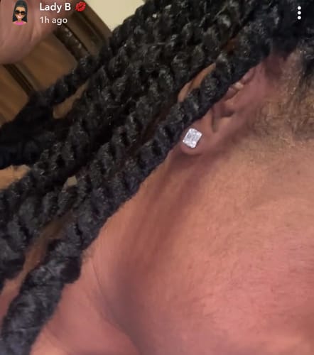 Customer photo review of MOISSANITE EMERALD CUT STUDS