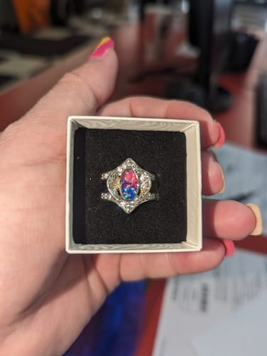 Customer photo review of Embraced Opal Angel Wings Ring with Cremation Ash