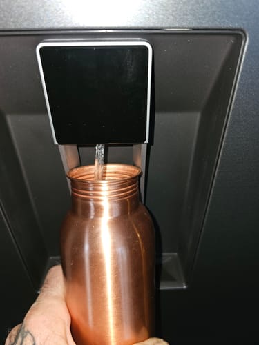 Customer photo review of Matte Copper Water Bottle