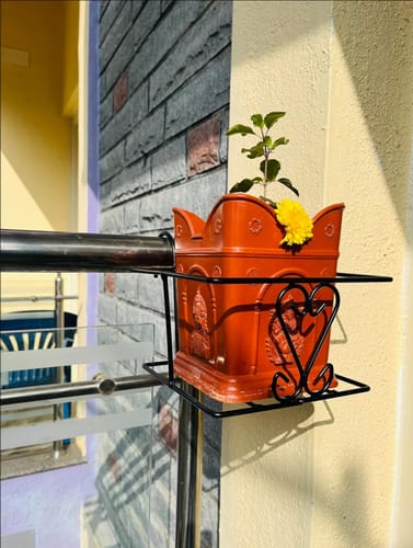 Customer photo review of Metal Railing Pot Stand (Set of 2) Decorative Pots Holder for Railings