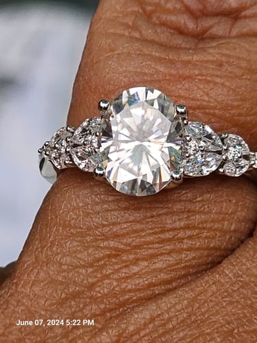 Customer photo review of Oval Cut Moissanite With Marquise Cluster Engagement Ring