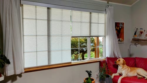 Customer photo review of SmartWings Motorized Light Filtering Roller Shades 70% Blackout Safari