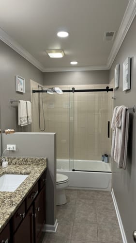 Customer photo review of SUNNY SHOWER 60" x 62" Bathtub Shower Door & Frameless Sliding Door for tub, Black Finish / Brushed Nickel Finish