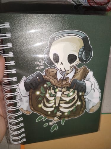 Customer photo review of Chilling Skeleton with Fireflies Small Reusable Sticker Book
