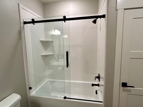 Customer photo review of SUNNY SHOWER 60" x 62" Bathtub Shower Door & Frameless Sliding Door for tub, Black Finish / Brushed Nickel Finish
