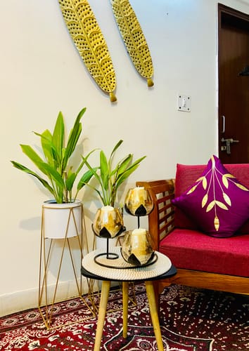 Customer photo review of United Crafts Metal Planter Stand for Home Décor (Gold & White Set of 2)