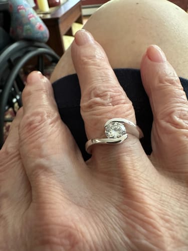 Customer photo review of Solitaire Tension Set Moissanite Bypass Engagement Ring