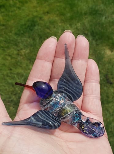 Customer photo review of Dichroic Twist Glass Hummingbird with Infused Ash