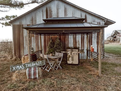 Customer photo review of SUNJOY 8x12 Brown Cedar Frame Grill Gazebo with Solar Power and Shelves - Brown