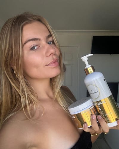 Customer photo review of Extra Volume Hair Growth Shampoo