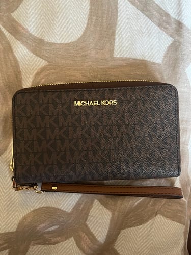 Customer photo review of Michael Kors Jet Set Monogram Wallet for Women (Brown)