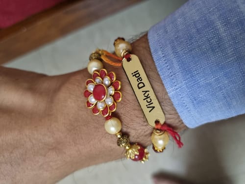 Customer photo review of Rakhi Combo | Pen, Keyring & Rakhi with Your Name | Best Rakhi Gift