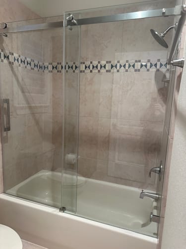 Customer photo review of SUNNY SHOWER 60" x 62" Bathtub Shower Door & Frameless Sliding Door for tub, Black Finish / Brushed Nickel Finish