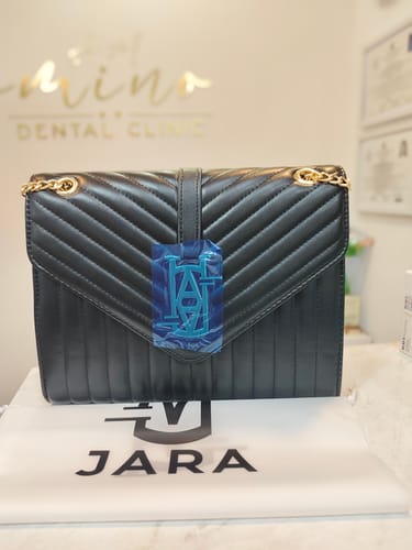 Customer photo review of MADRID LEATHER ENVELOPE BAG