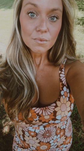 Customer photo review of Flower Power Paros Onesie