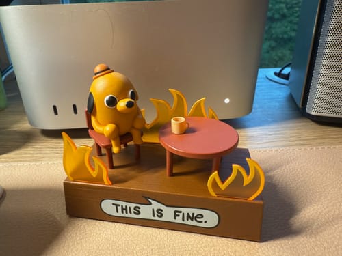 Customer photo review of This Is Fine Talking Figurine: With Light and Sound! (Desktop Accessory)