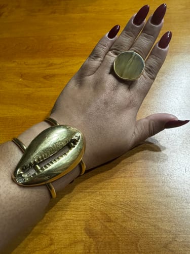 Customer photo review of Supersized Gold Cowry Bracelet