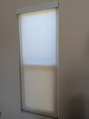 Customer photo review of SmartWings Motorized Light Filtering Roller Shades 70% Blackout Safari