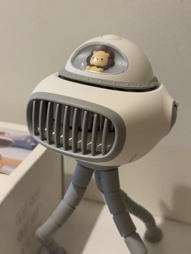 Customer photo review of 3-In-1 Spaceship Pram Fan with Music Box