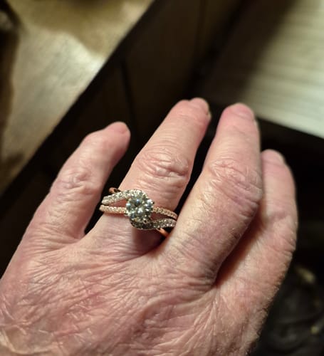 Customer photo review of Rose Gold Two Tone Moissanite Criss-Cross Pave Engagement Ring