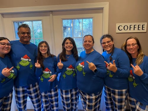 Customer photo review of Christmas Green Cartoon Character With Santa Hat Pattern Print Blue Top And Blue & White Pants Family Matching Pajamas