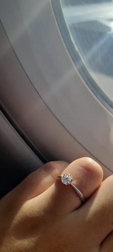 Customer photo review of Classic Solitaire Moissanite Six-Prong Sterling Silver Engagement Ring