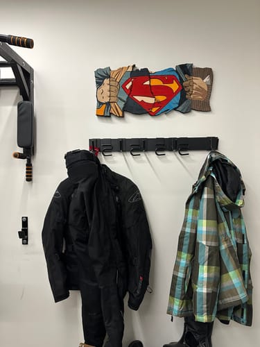 Customer photo review of SUPERMAN THROUGH THE YEARS POSTER