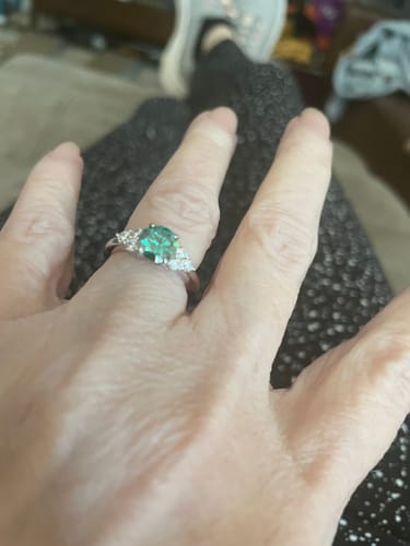 Customer photo review of Green Moissanite Side Stone Engagement Ring
