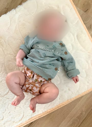 Customer photo review of Patterned Basics Pocket Cloth Diaper with Athletic Wicking Jersey