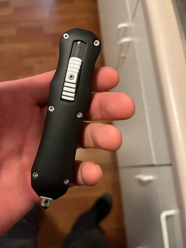 Customer photo review of Black Reaper OTF Knife