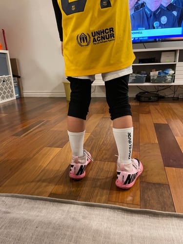 Customer photo review of NEW! 4 Pack Black and White Combo Youth/XS ULTRAGRIP V2 Dual sided Non-slip Technology Socks