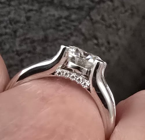 Customer photo review of Round Moissanite Graduated Channel Set Accents Engagement Ring