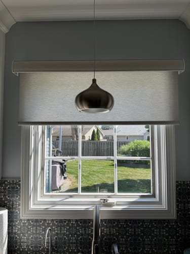 Customer photo review of SmartWings Motorized Light Filtering Roller Shades 70% Blackout Safari